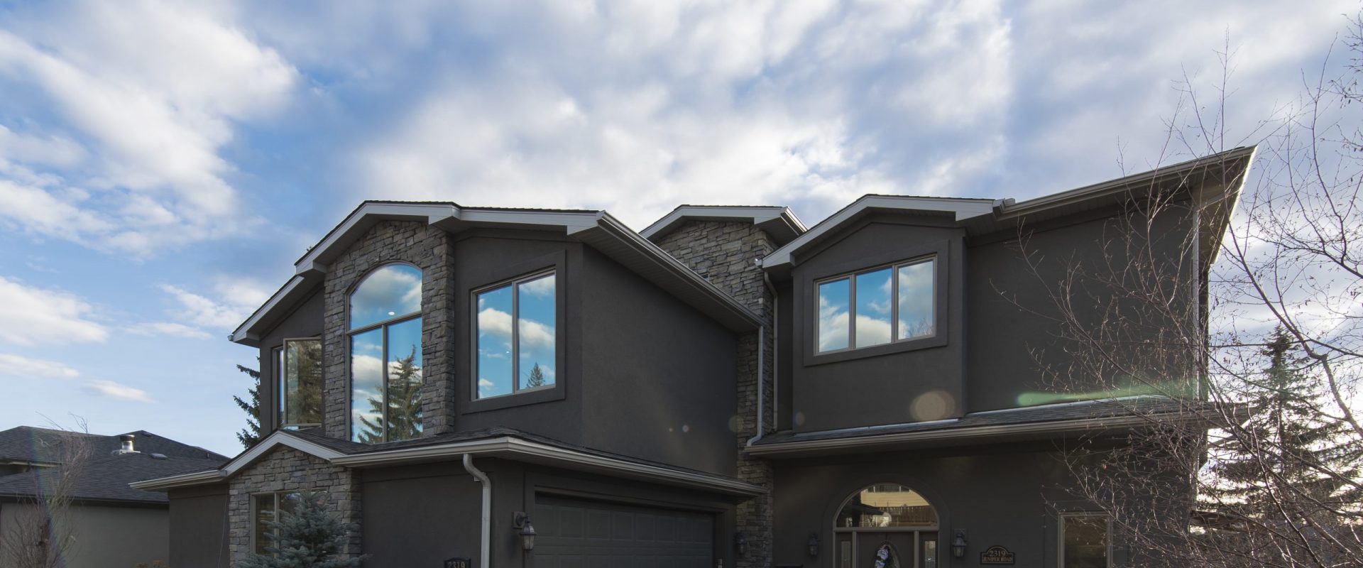 A wide shot of the beautiful architecture of a modern house